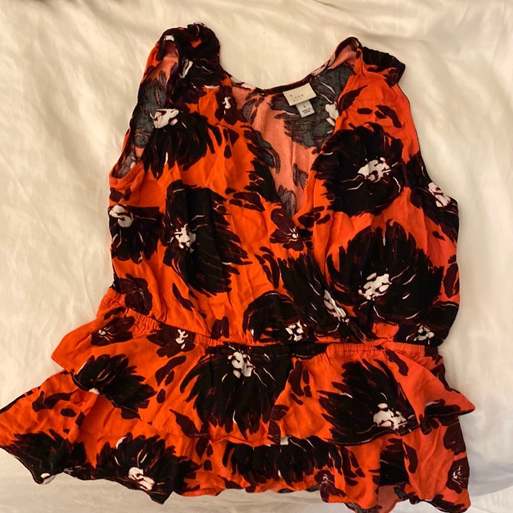 A. New Day red floral peplum top